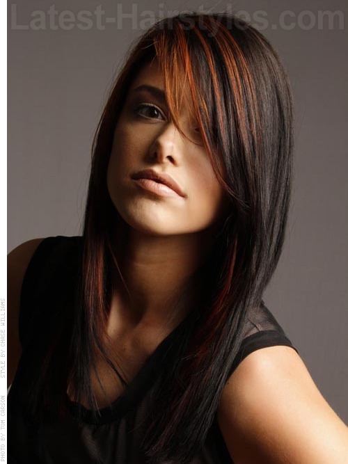 A long red and black sleek hairstyle