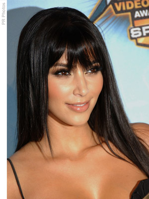 Kim Kardashian with long straight hair with bangs