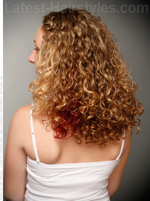 Curly Hairstyle with Pop of Red Back