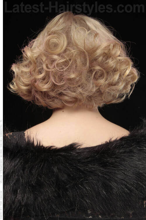 Bobbed Hairstyle with Curls and Fringe Back