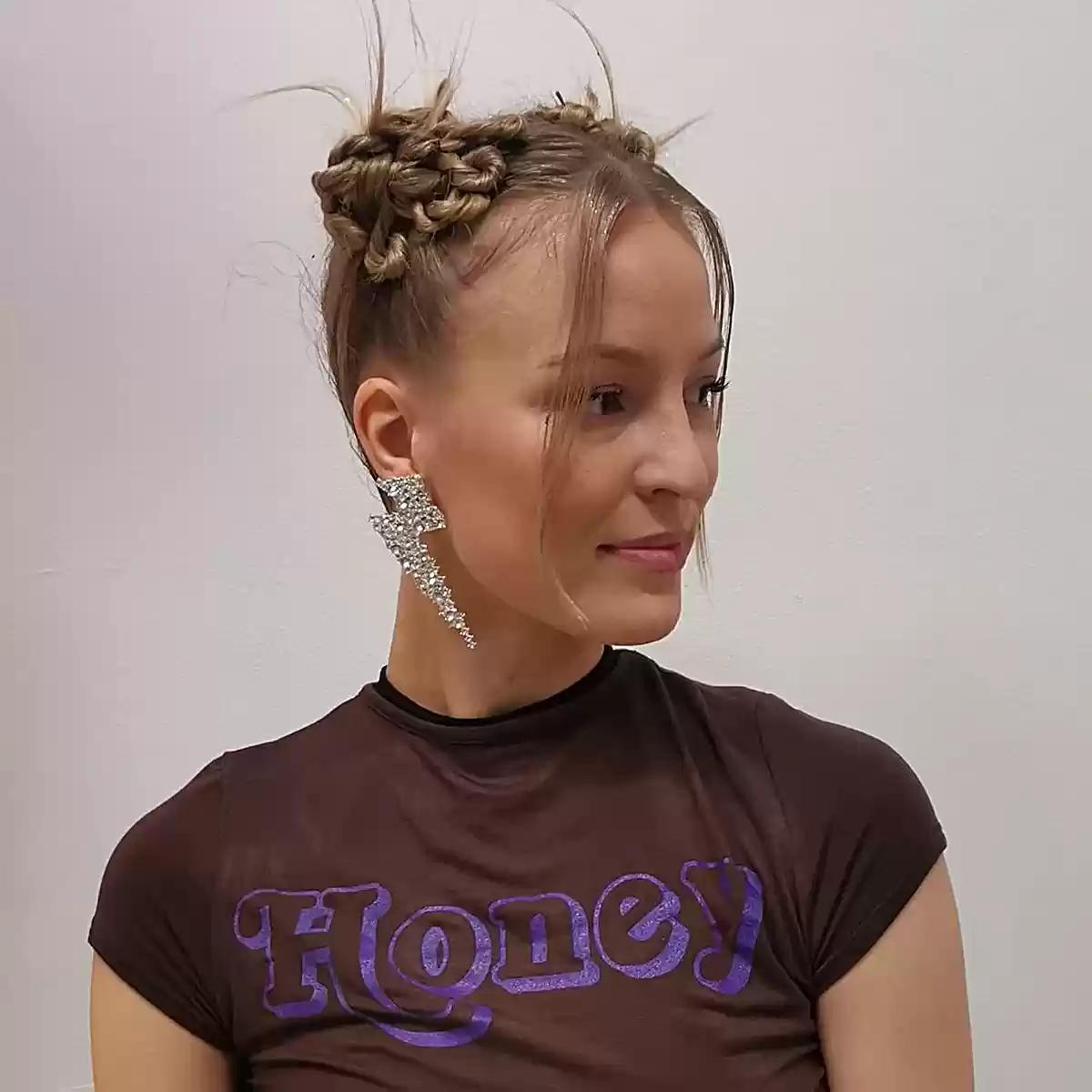 2000-Inspired Double Bun Hairstyle with Face-Framing Pieces for Long Faces
