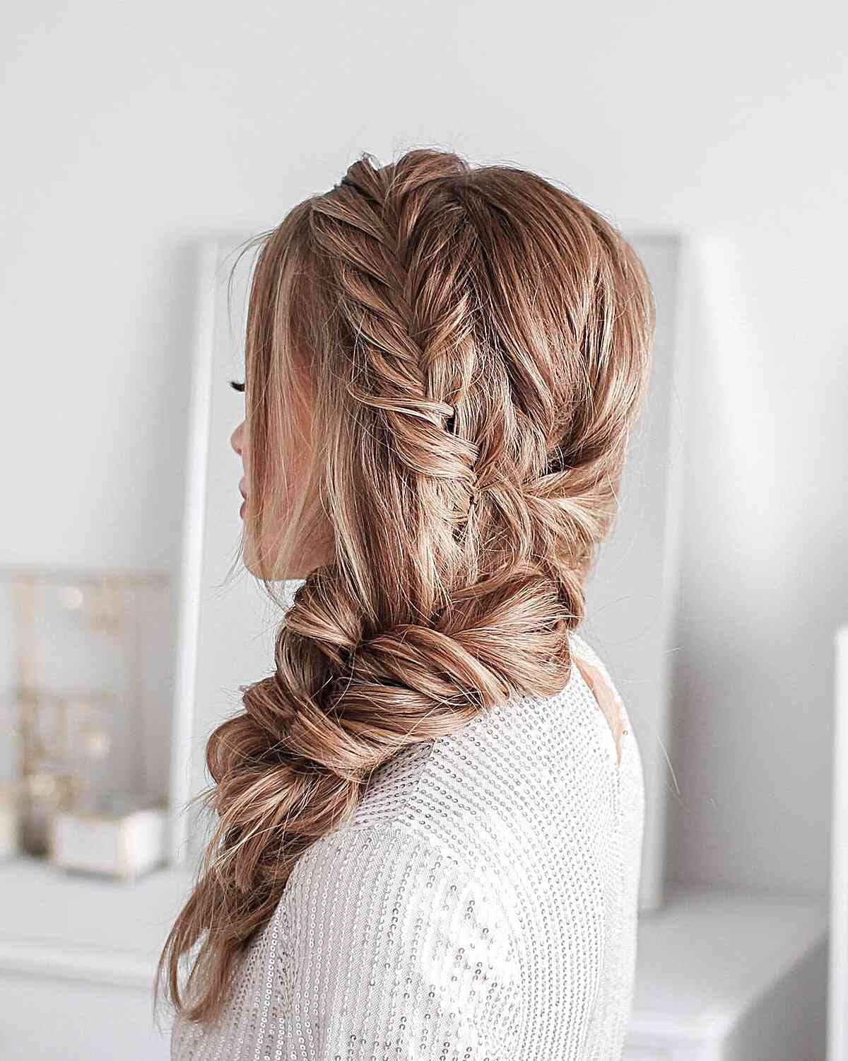 A half updo with a fishtail braid