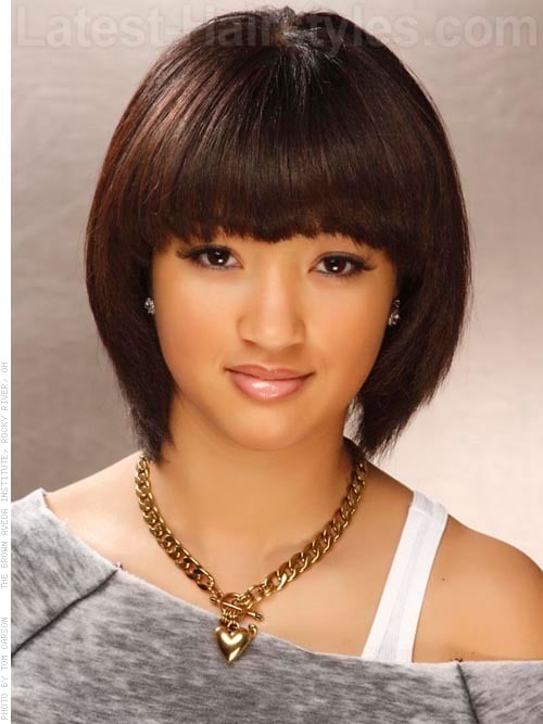 Dark hair color in short bob with thick bangs