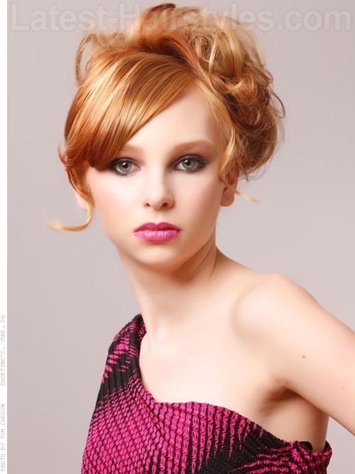 Teen with red hair color & blonde highlights