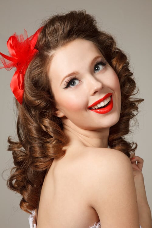 Sweet Curly Pin Up Hairstyle with Red Bow