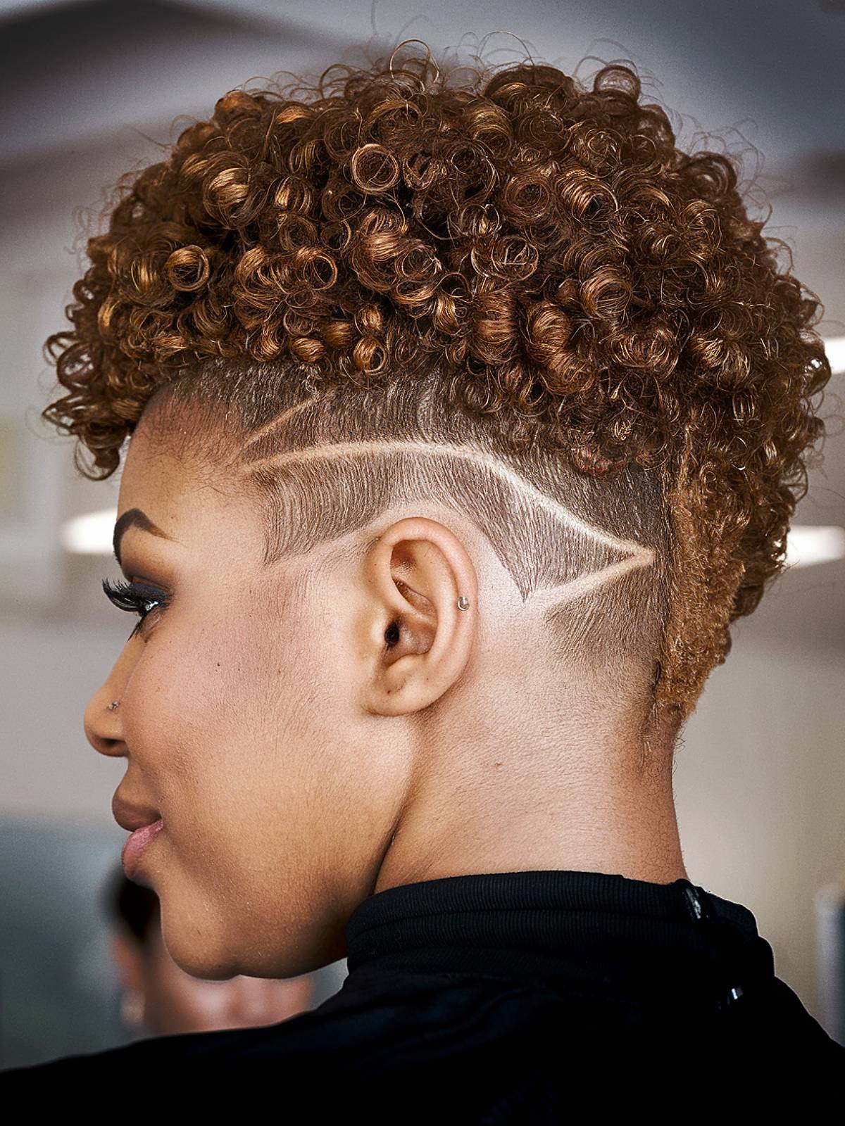 4B natural hair with a shaved undercut design