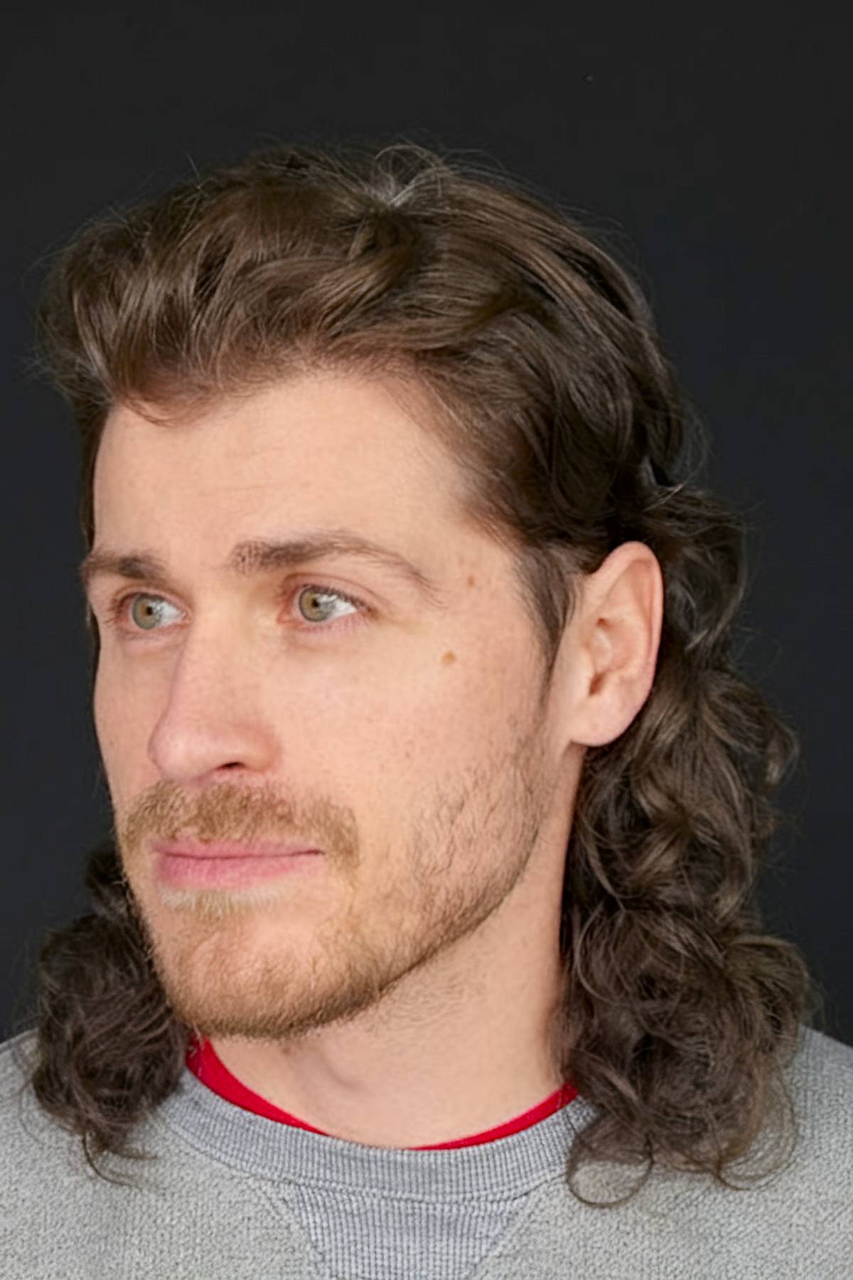 70s inspired shaggy mullet for men hairstyle