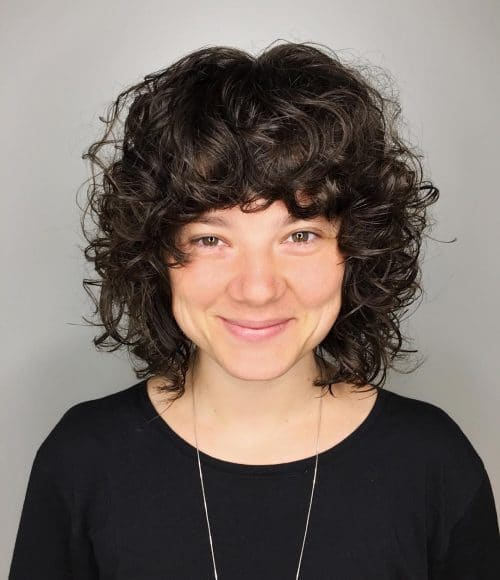 The coolest 70s Inspired curly bob black