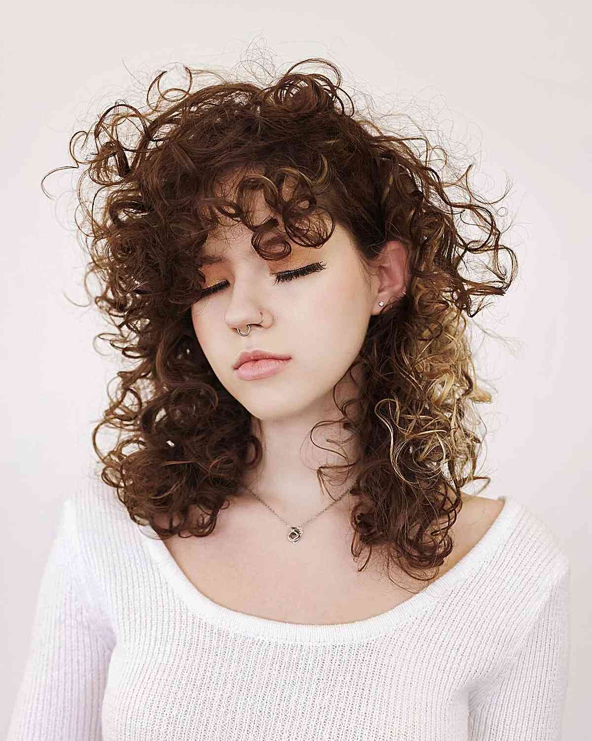 80s-Inspired Layered Shag with Bangs for Brown Curly Hair