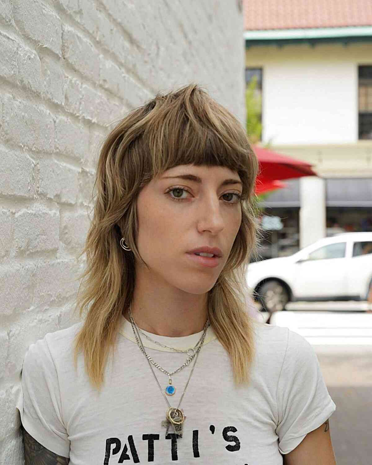 80s-Inspired Mullet Shag for Thick Hair at mid-length