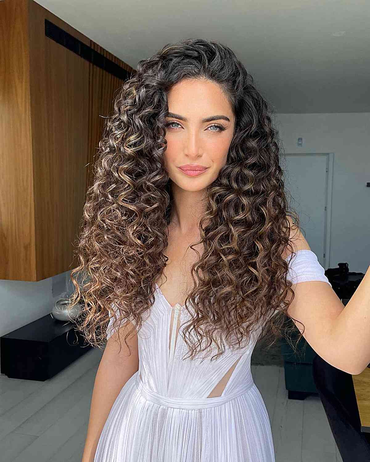 90s-Inspired Brunette Ombre for Long Curly Hair