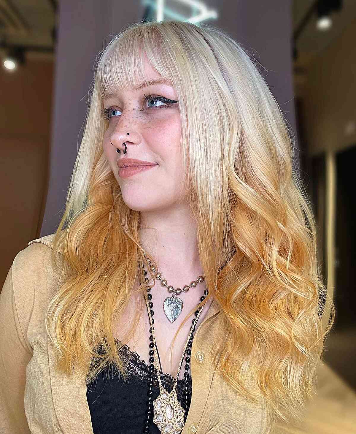 90s-Inspired Reverse Bleach Blonde Ombre with Bangs for Long Hair