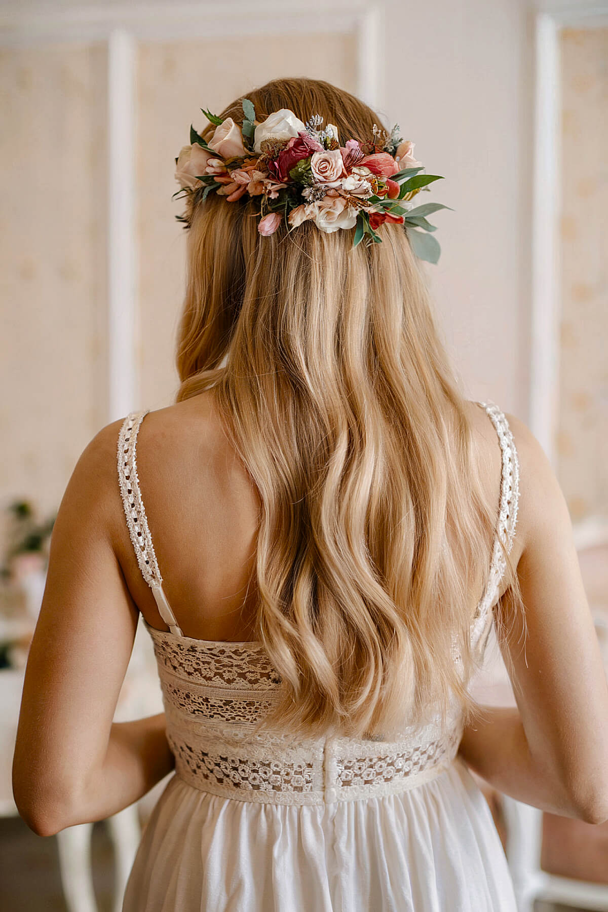 Half-up wedding hair with floral crown