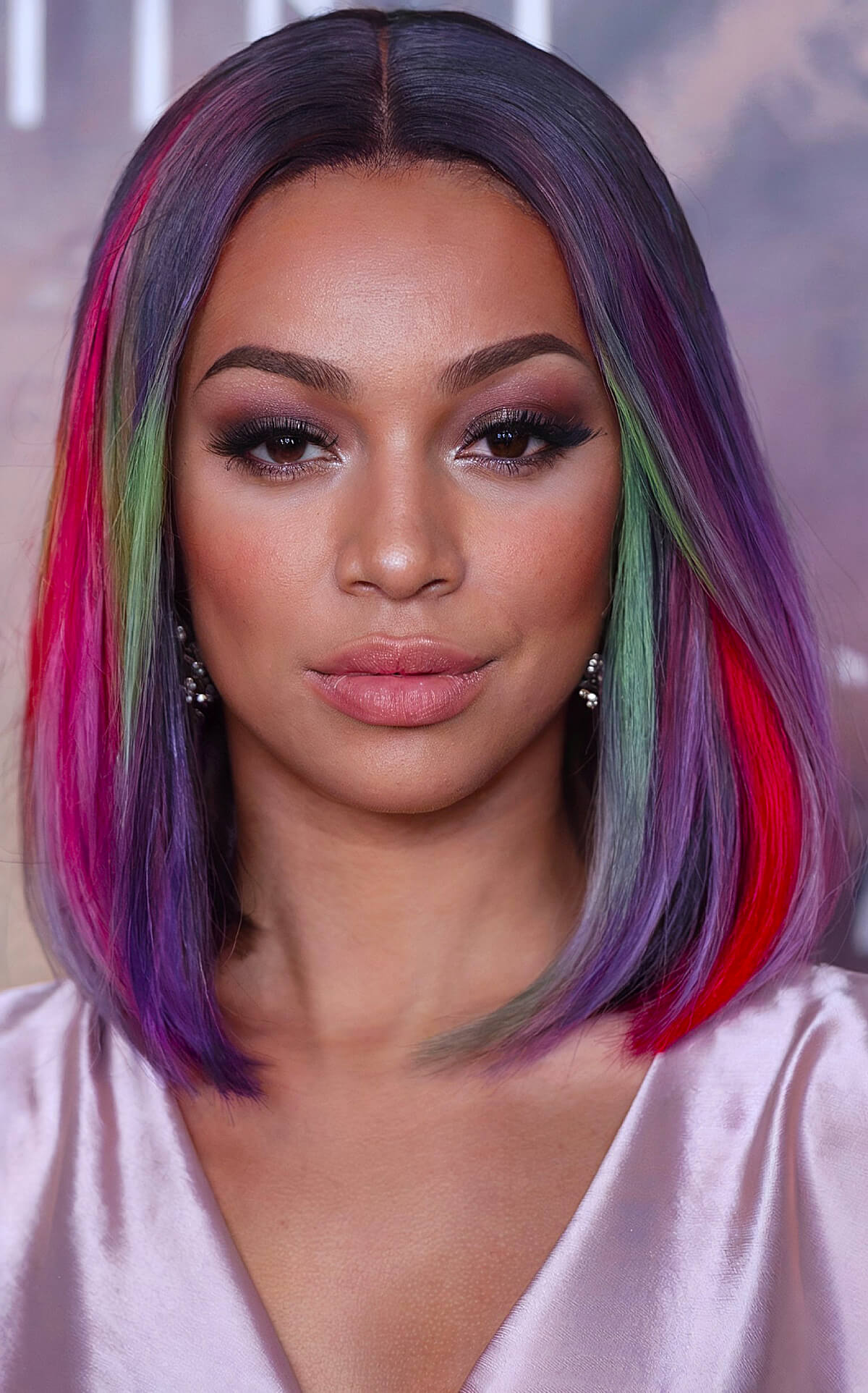 Christmas hair color idea for Black women with red, green, and purple bob