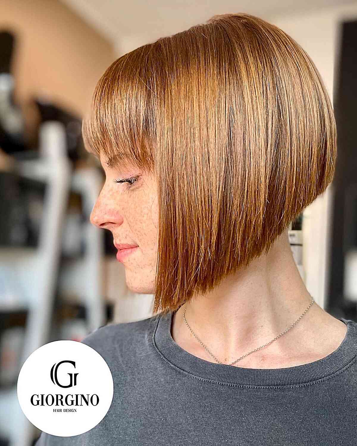 A-Line Bob Cut with Bangs and a Shaved Nape for women with light colored hair