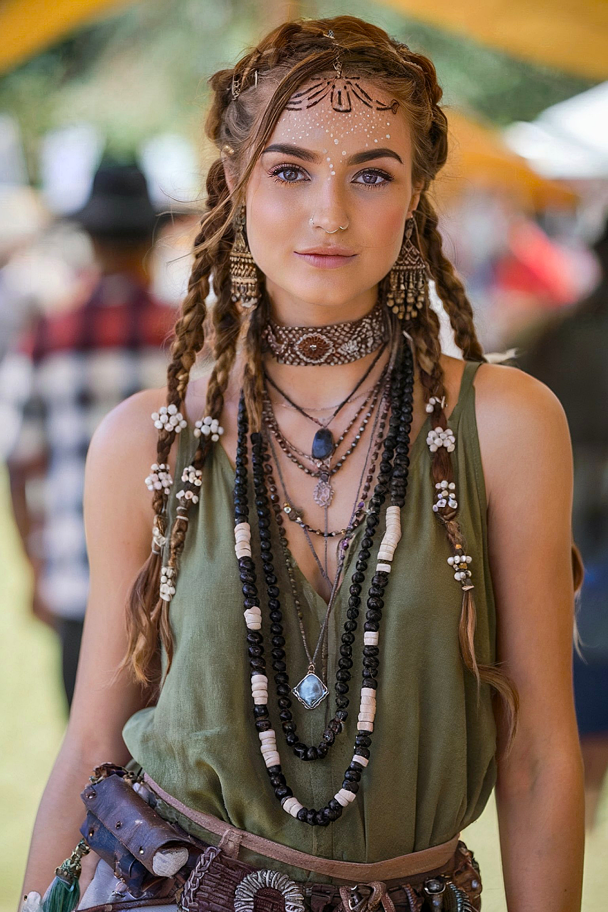 Earth-toned synthetic rave braids with beads for a boho look