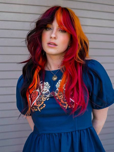 a red balayage with touches of orange