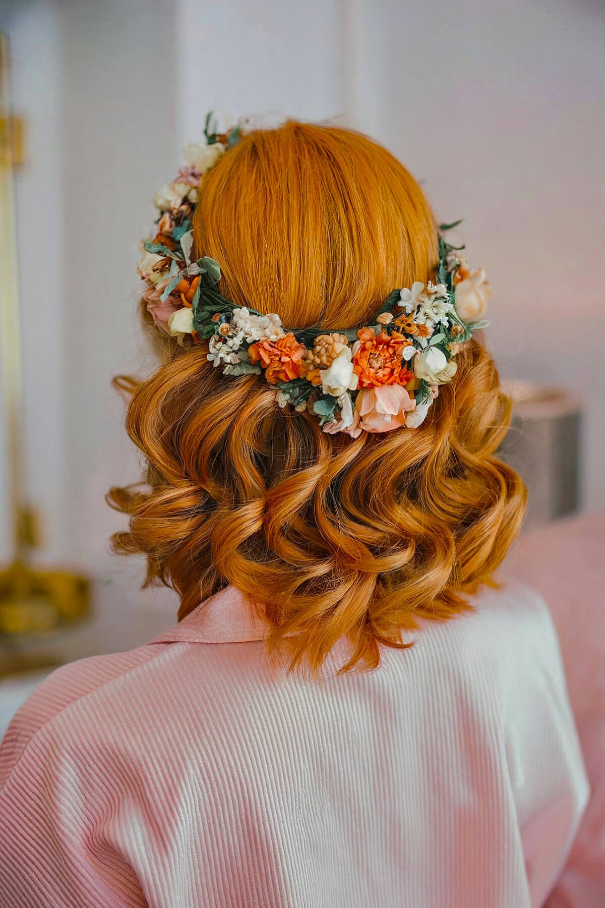 Short curls with flower crown for wedding