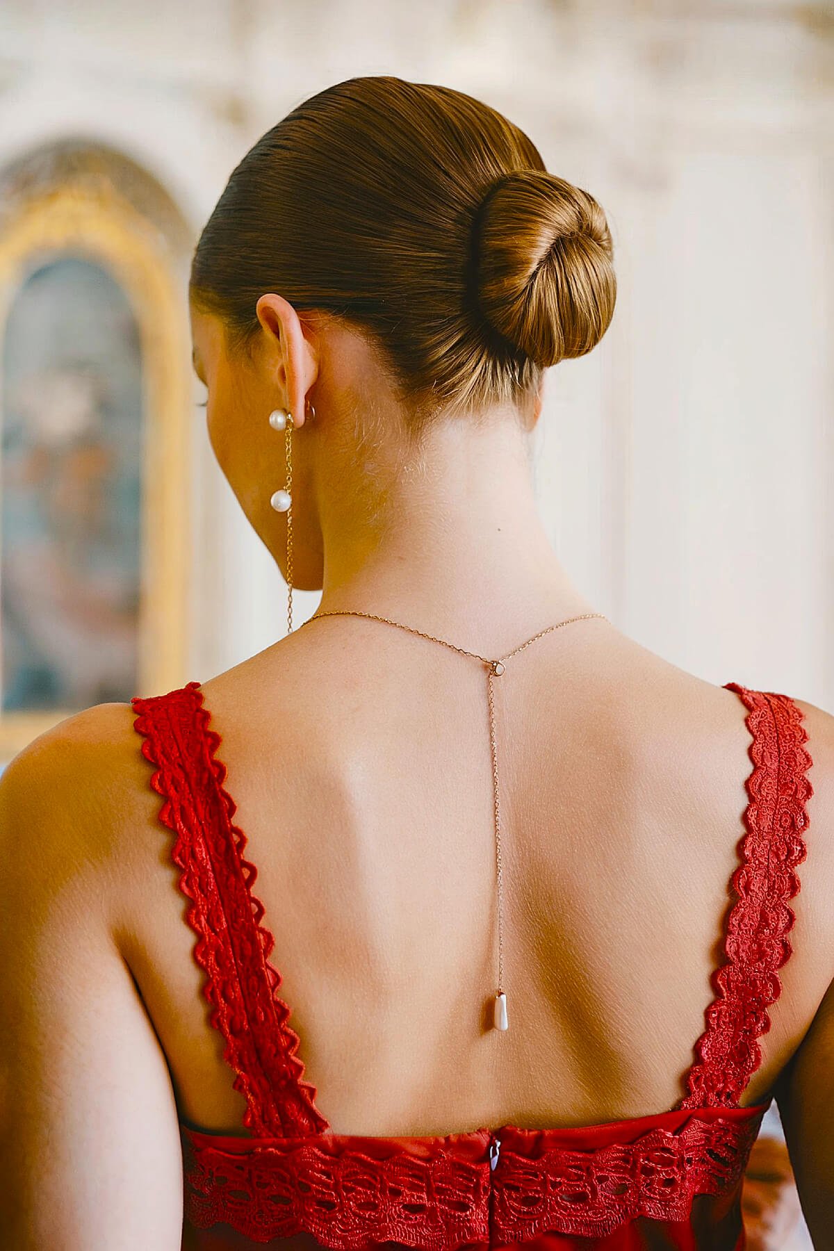 Sleek low chignon wedding updo