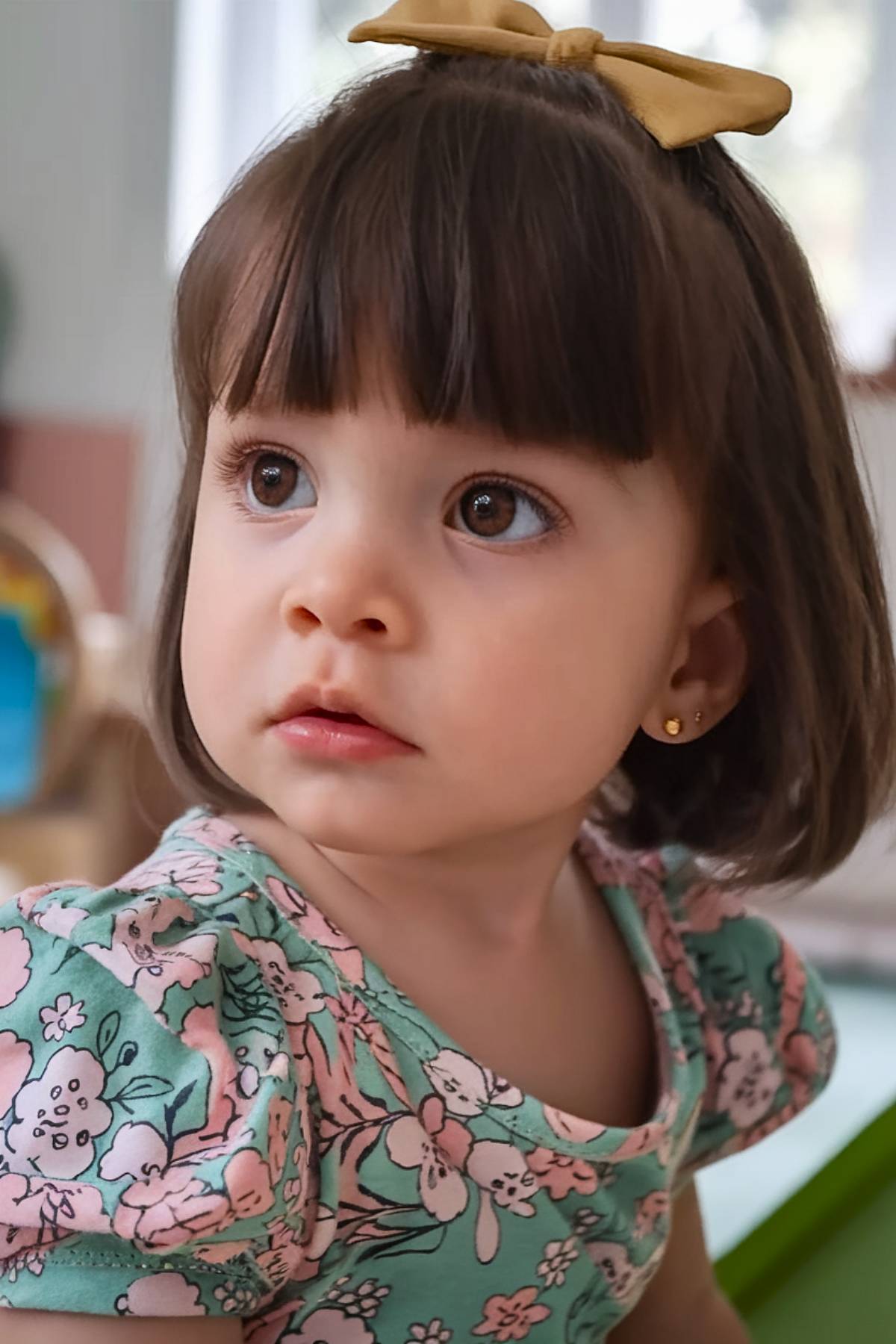 Toddler bob haircut with blunt cut and straight fringe