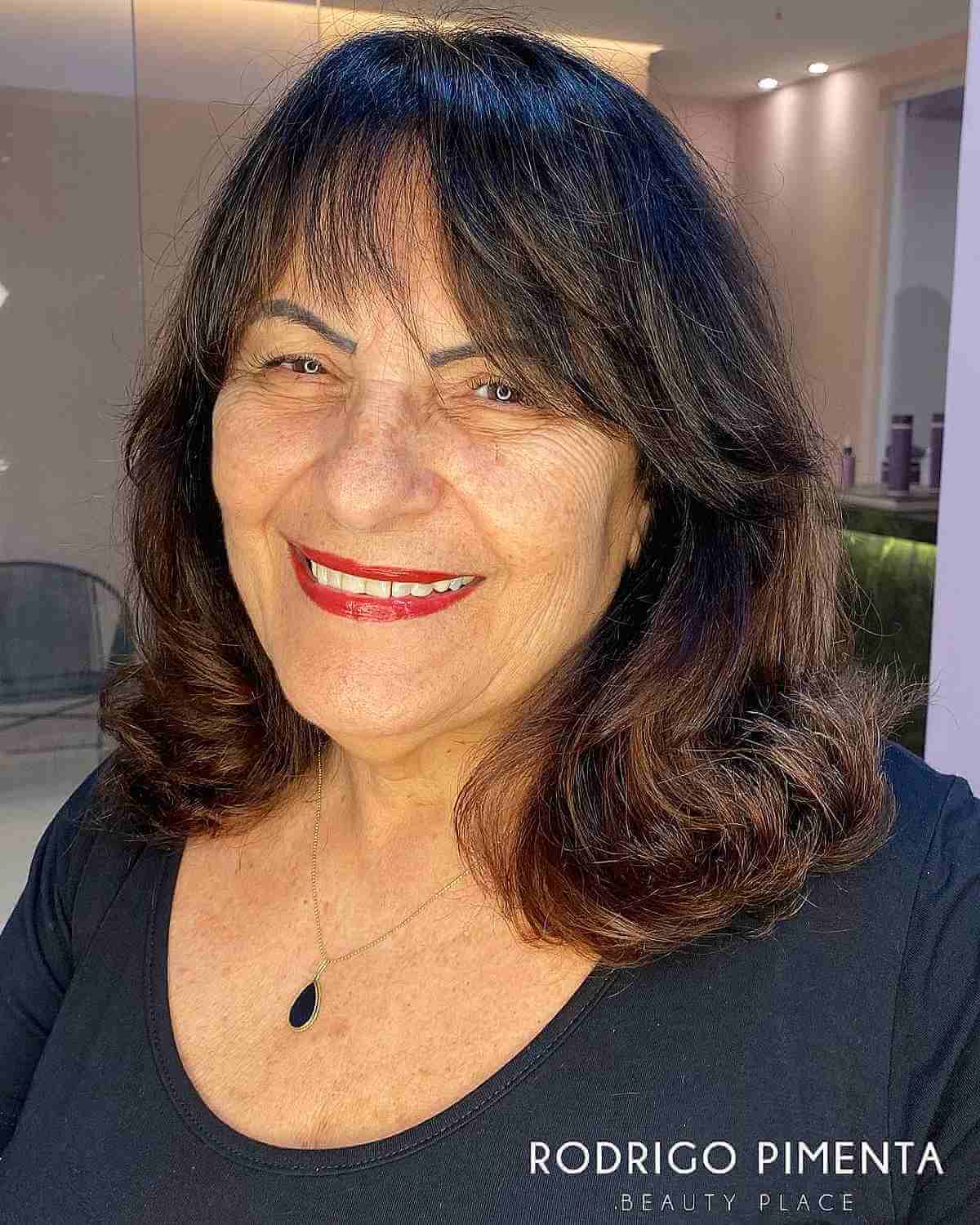 Airy Medium-Length Hair with Soft Bangs for Women Over Fifty