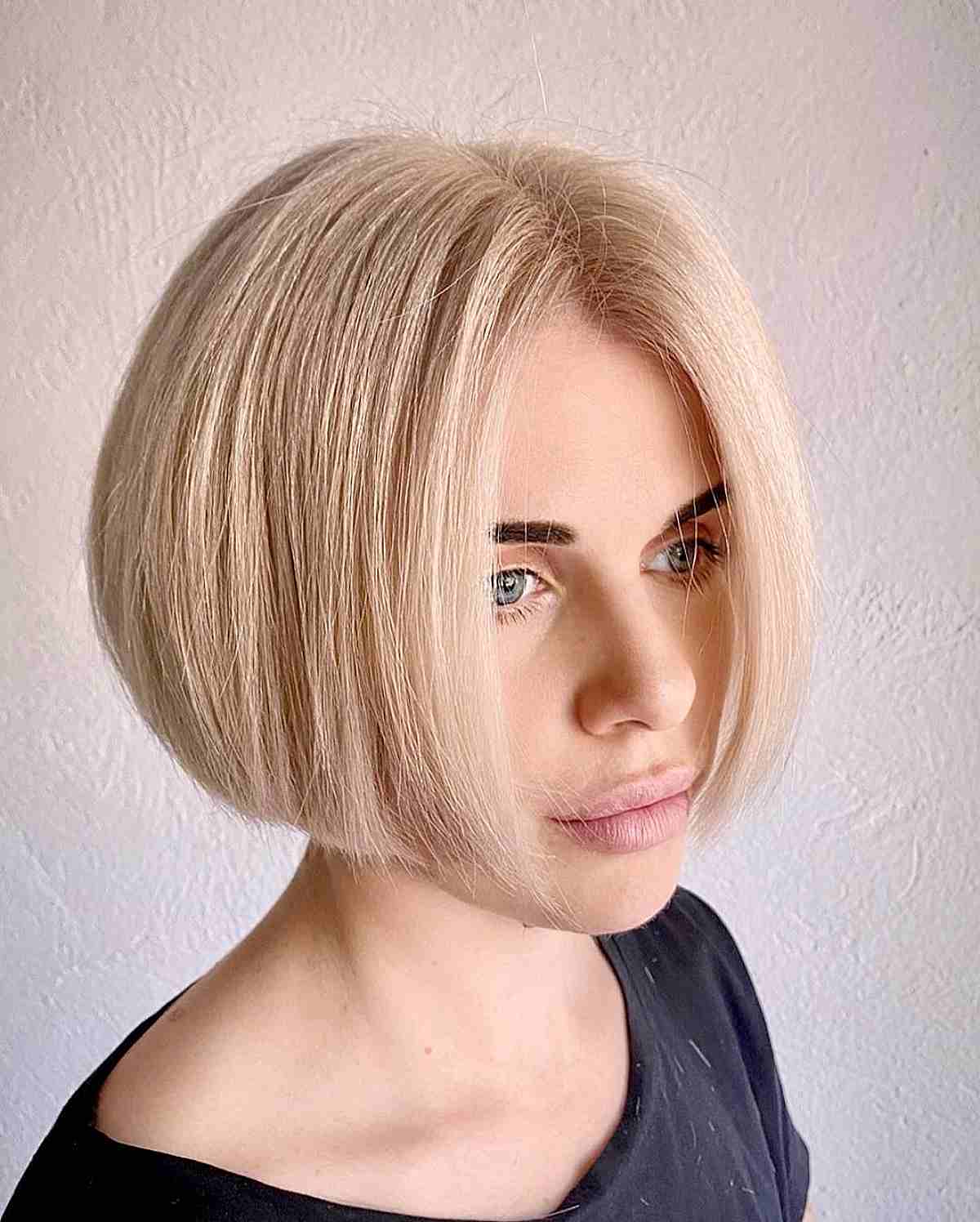 All Over Blonde on a Blunt Bob with a Middle Part