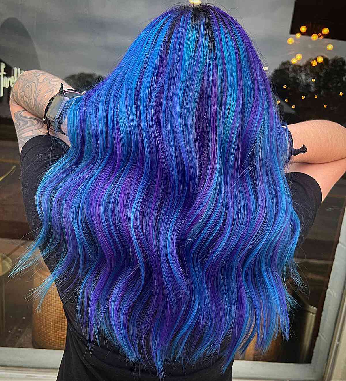Amazing Blue and Purple Balayage Hair for ladies with long wavy tresses