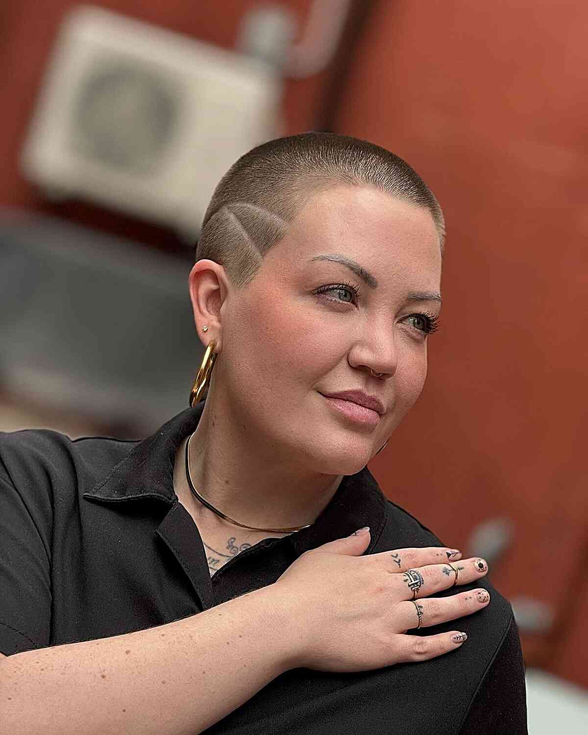 Androgynous Buzz Haircut with Shaved Lines for Ladies