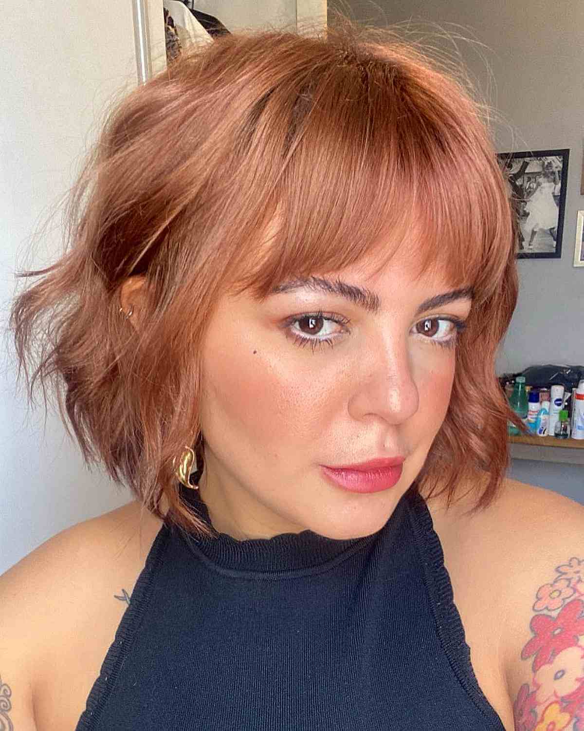 Angled Layers and Beachy Waves on a Short Bob with Bangs