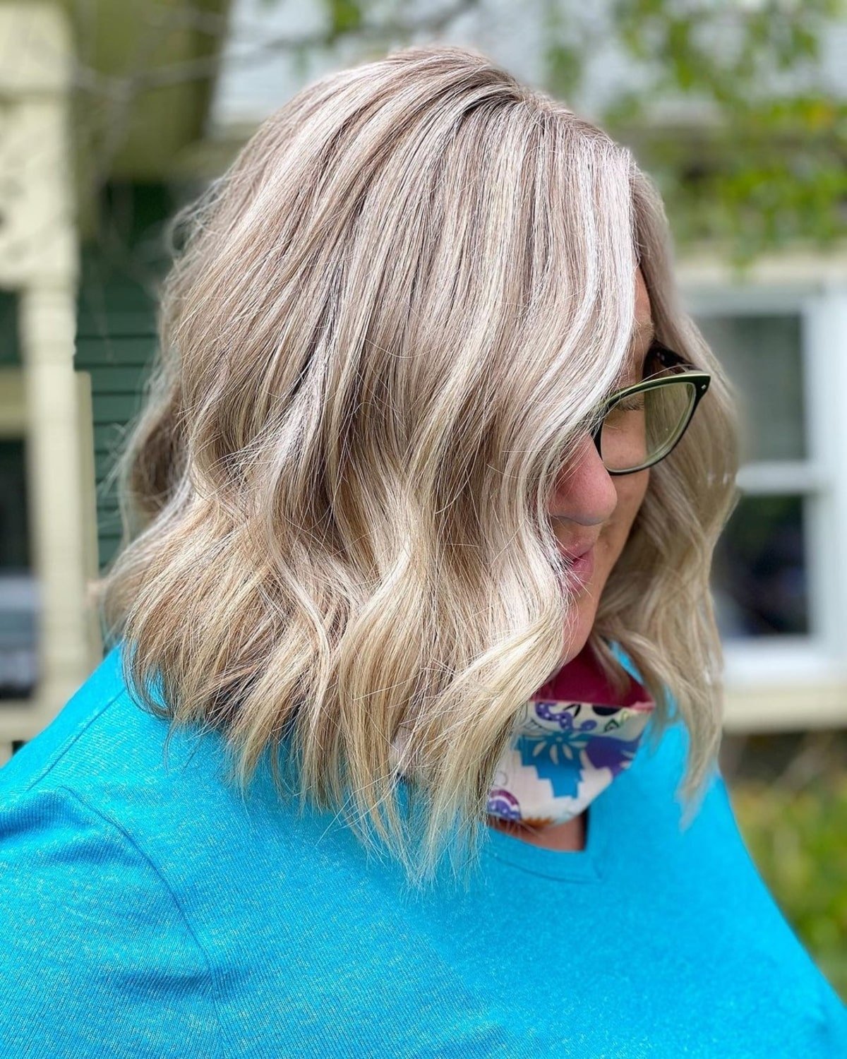 Youthful angled lob for women over 50 with glasses