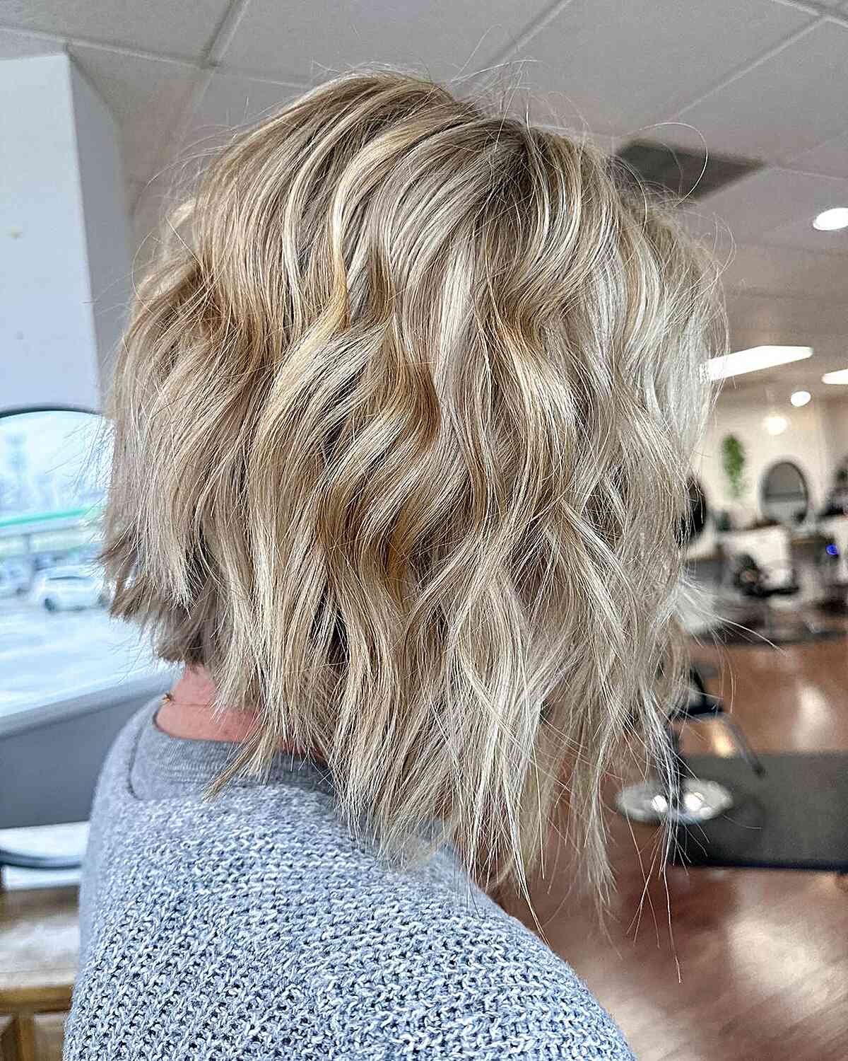 Angled Wavy Blonde Bob with Jagged Ends