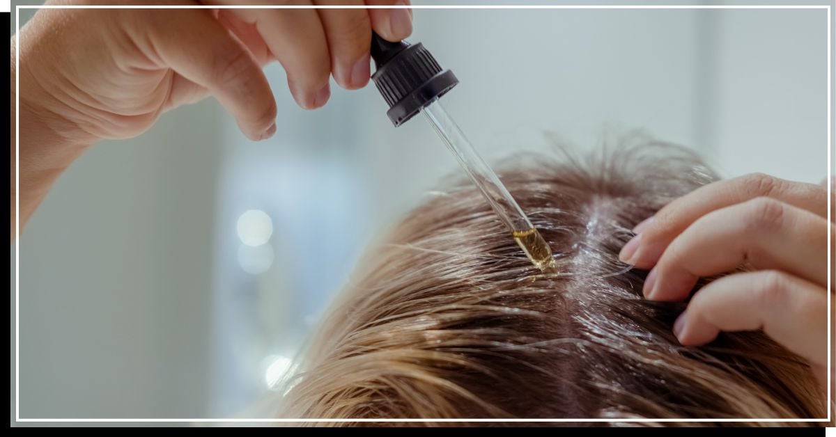 Applying olive oil on scalp