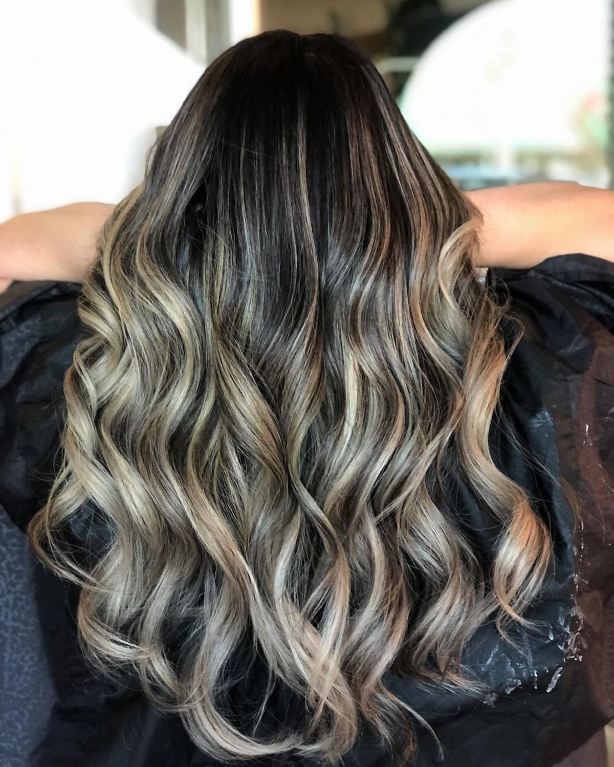 Gorgeous ash blonde ombre with black roots