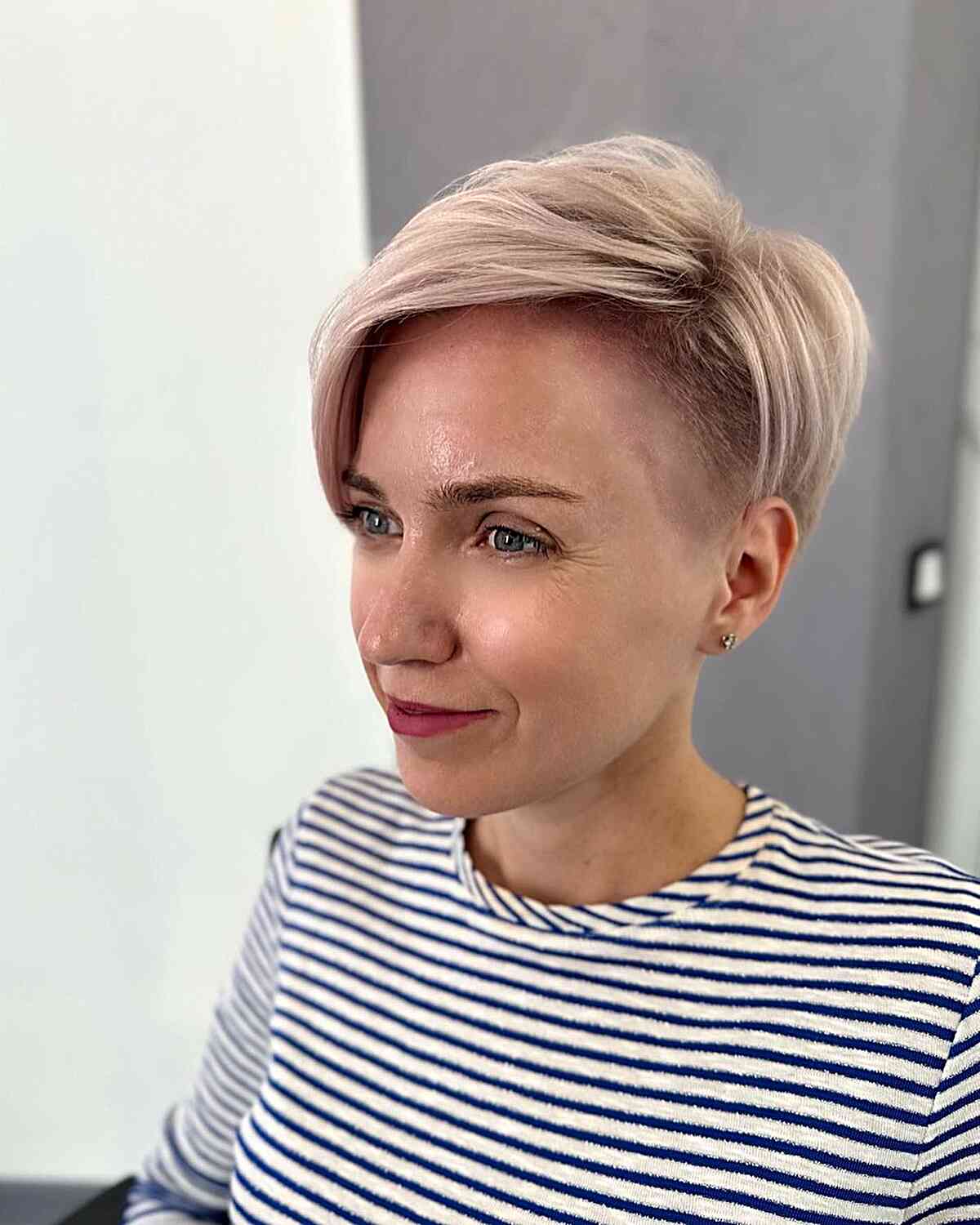Ash Blonde Pixie with Shaved Side and Side Part