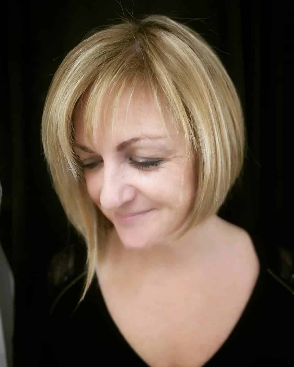 Voluminous Asymmetrical Layered Bob for 60 year olds