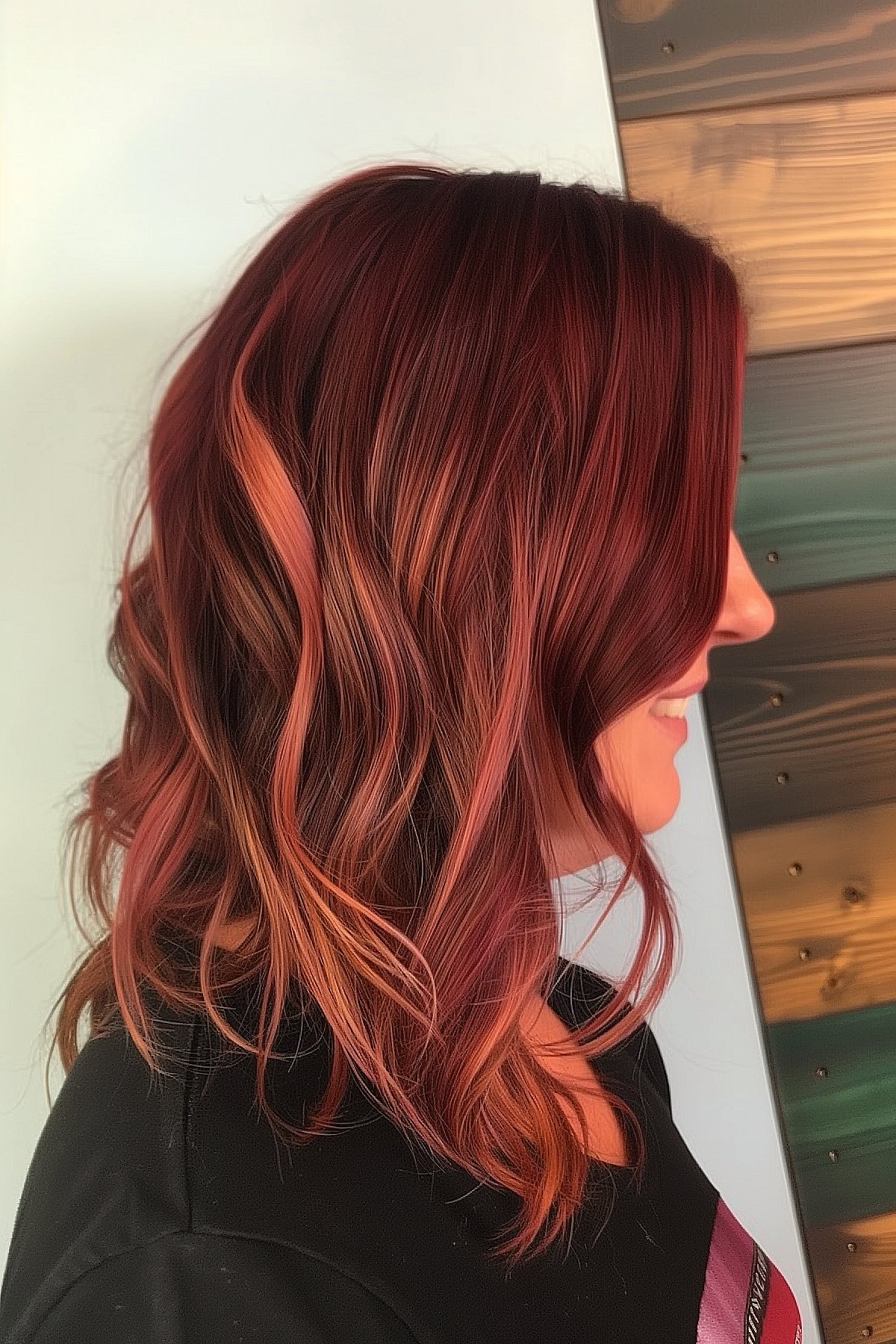 Medium asymmetrical lob with reverse ombre from dark red to copper