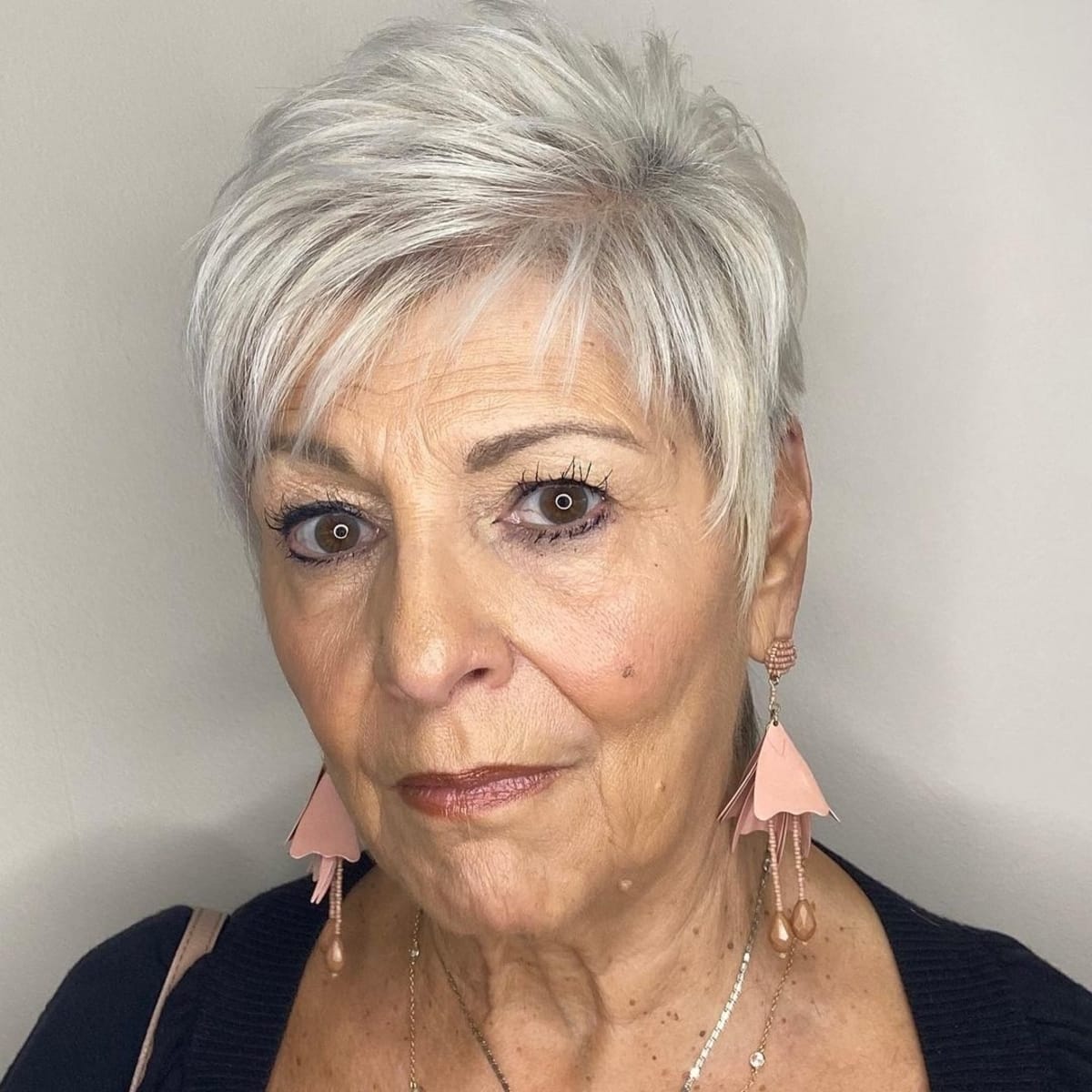 Asymmetrical Pixie Cut for women over 60 with Grey Hair