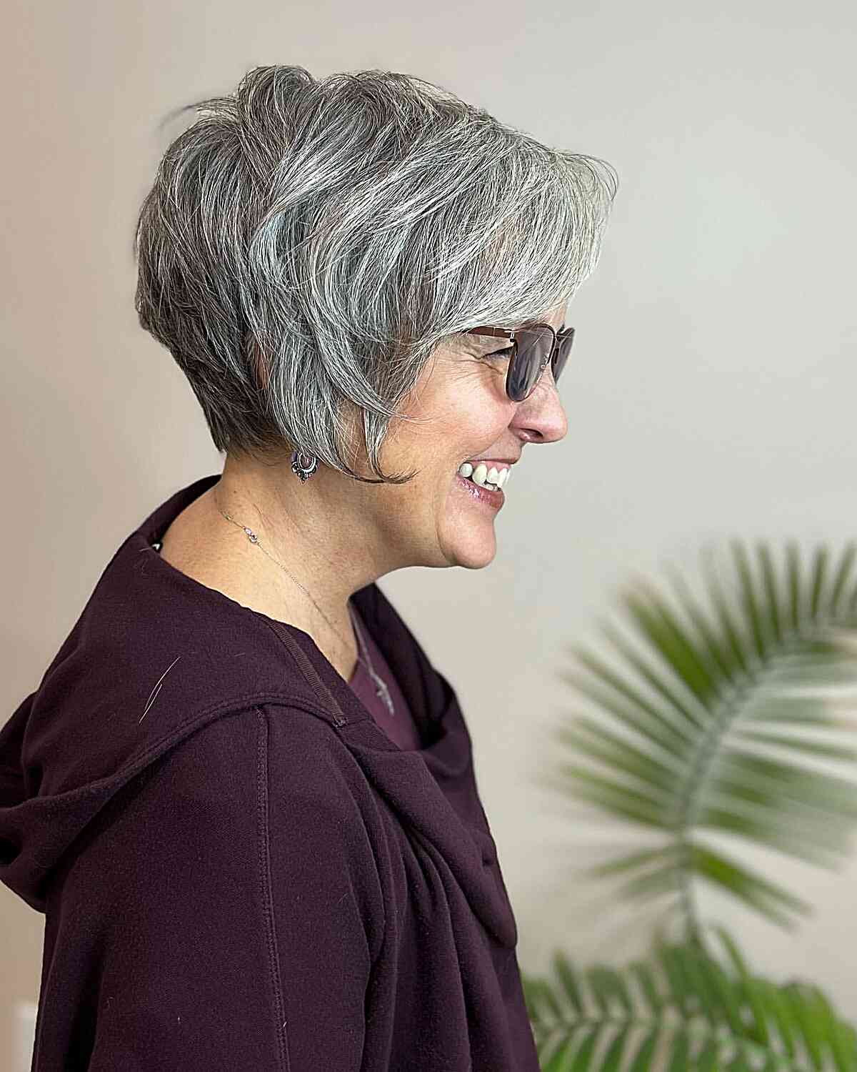 asymmetrical pixie for older ladies in their 50s with gray hair