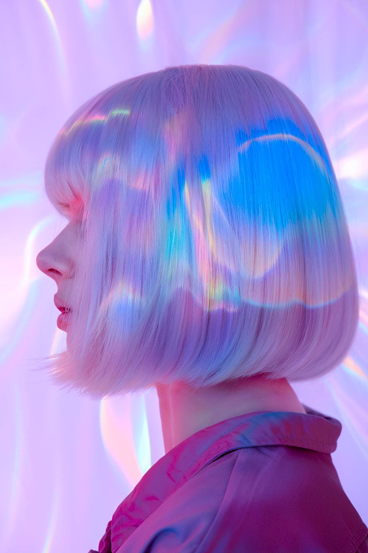 Holographic aura quartz bob with pastel blues, purples, and pinks that shift under light