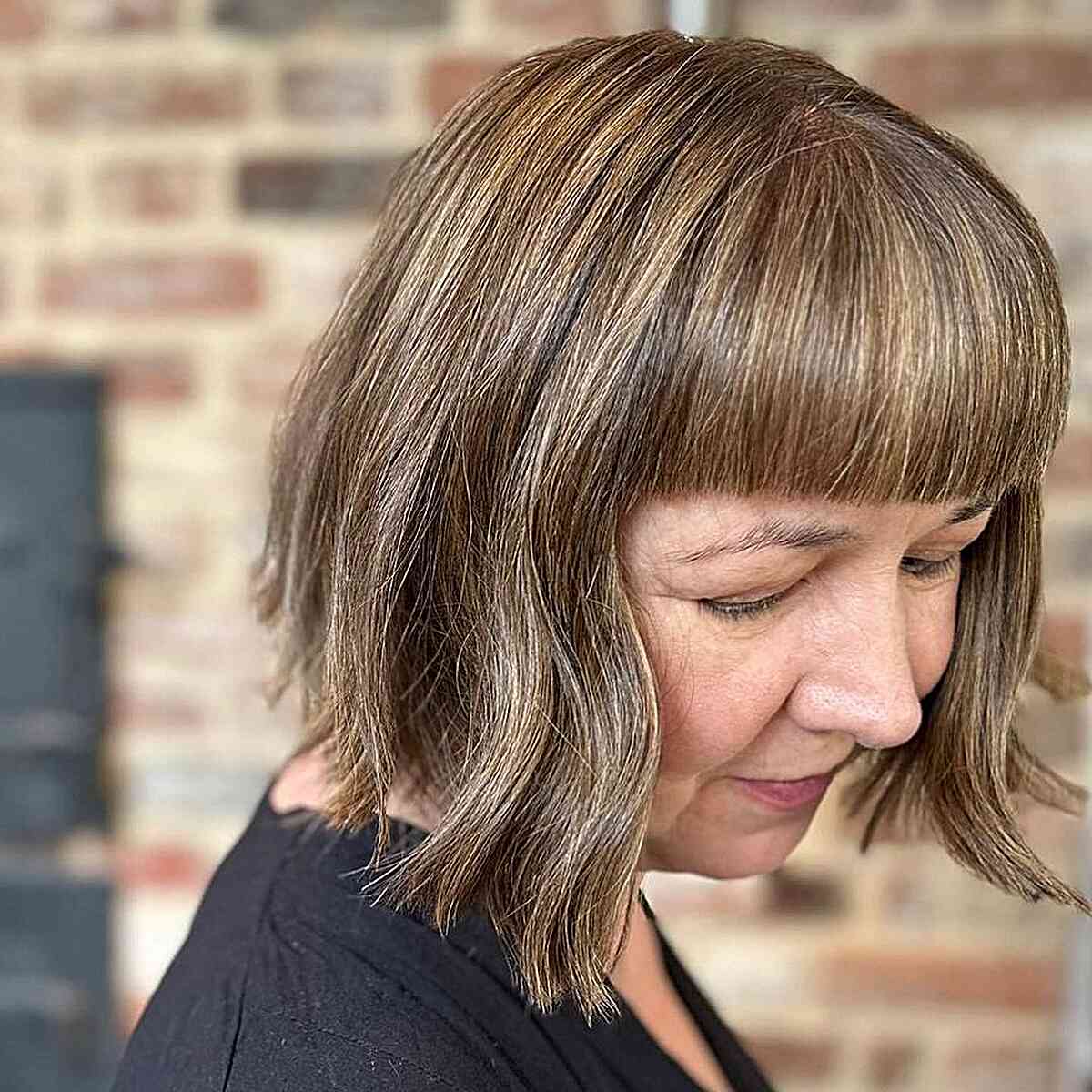 Autumn Brown Bob with Blonde Babylights and Bangs for Ladies Aged 60