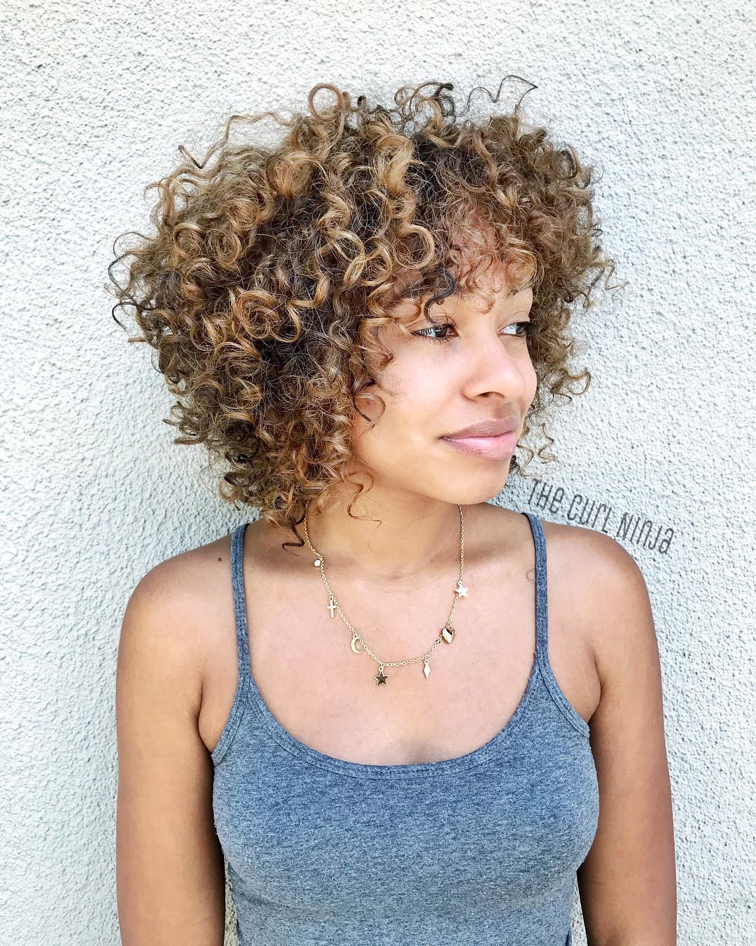 Golden Blonde Balayage for Short Curly Hair