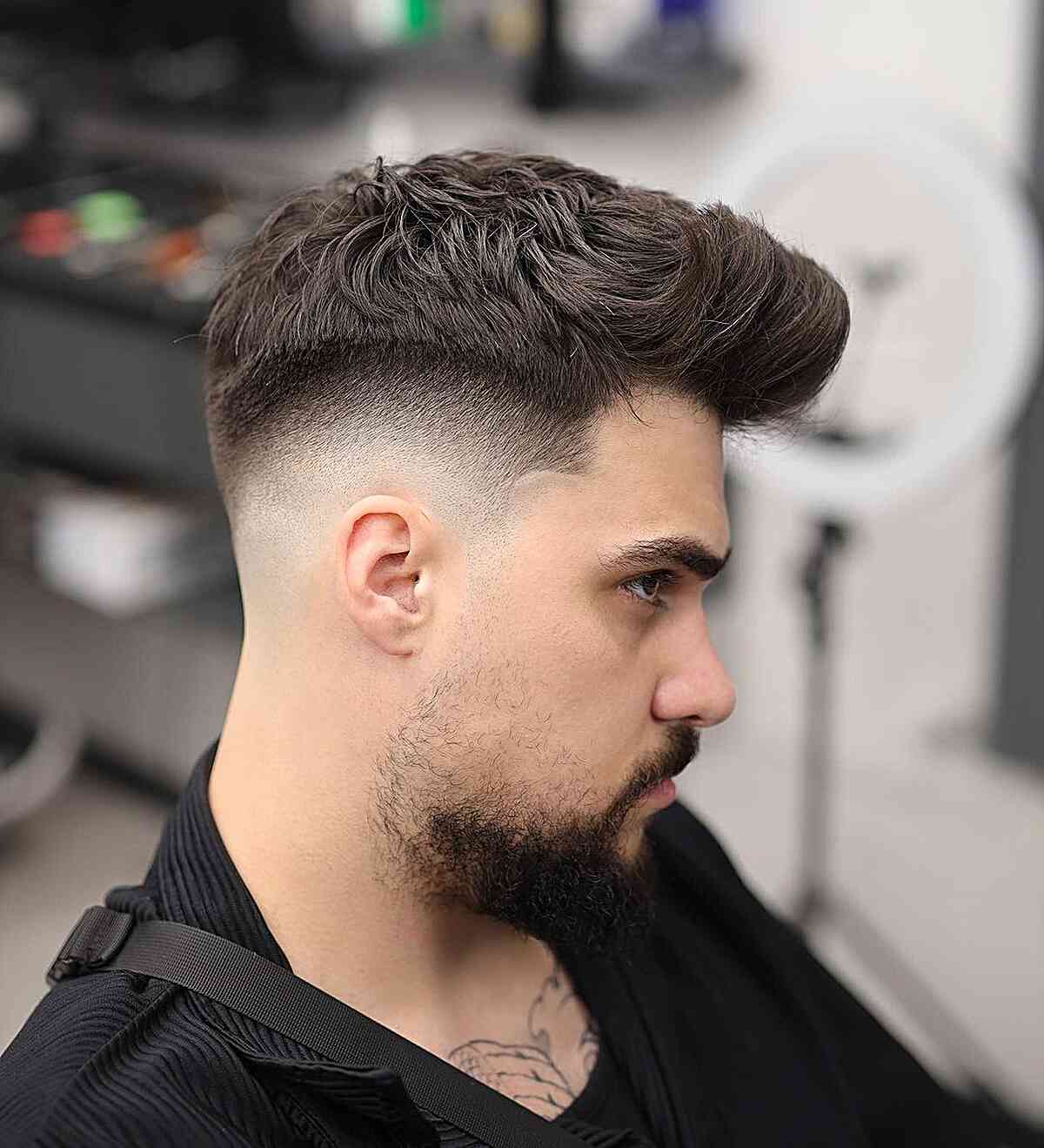 Bald Fade with a Long Pomp-Style Top for Guys with thick hair