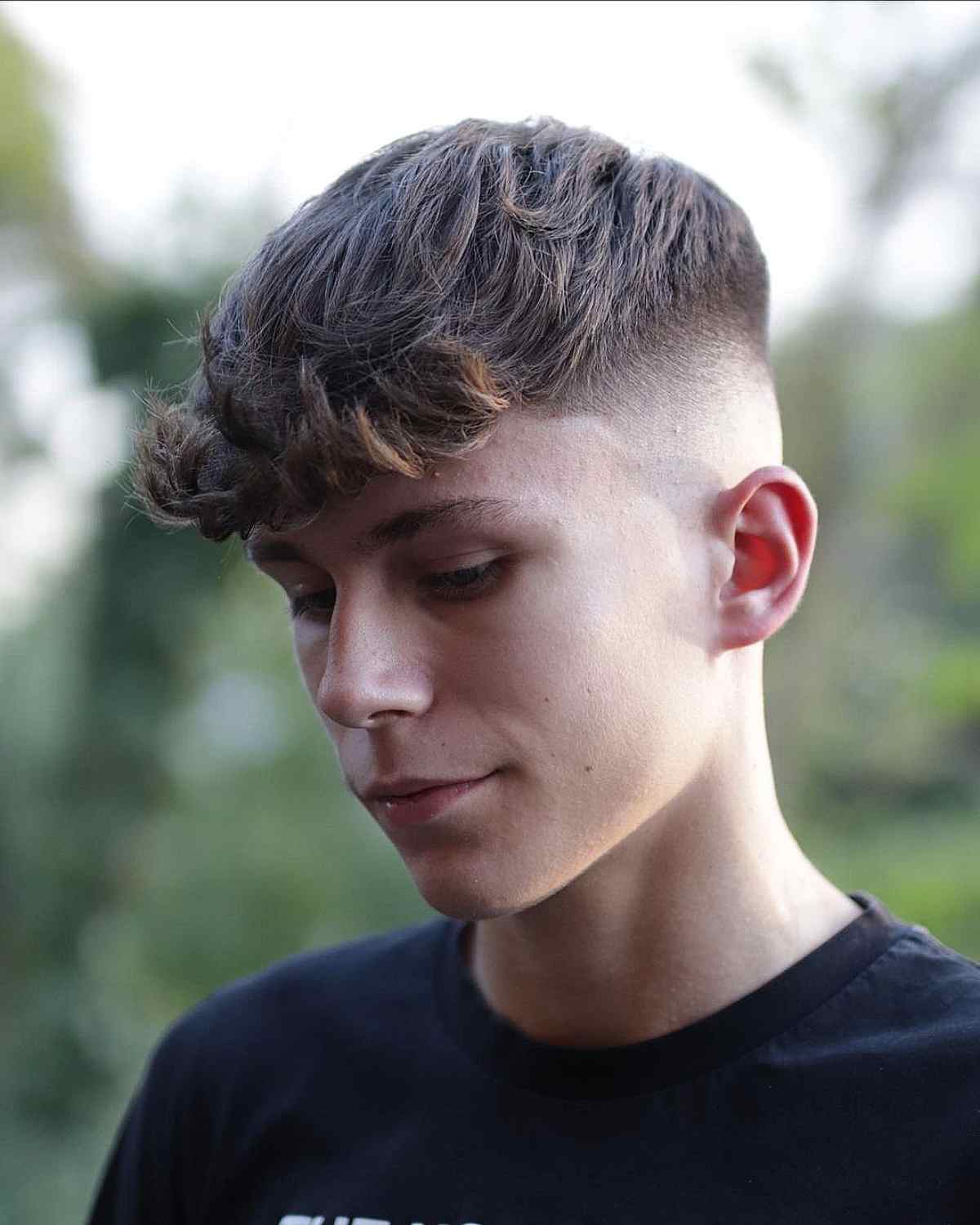 Bald Fade with Thick Waves on Top for Teens