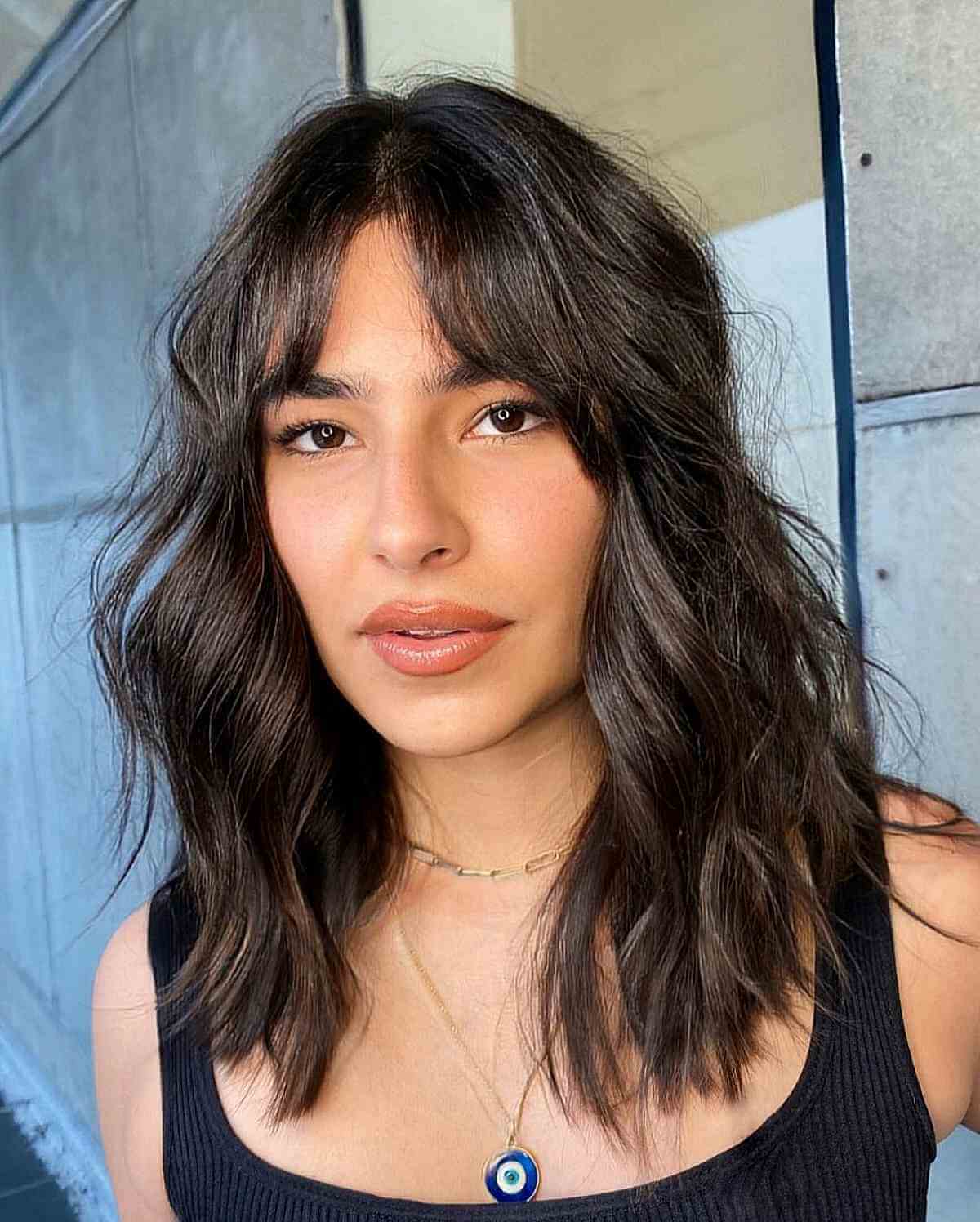 70s-Inspired Bangs and a Middle Part