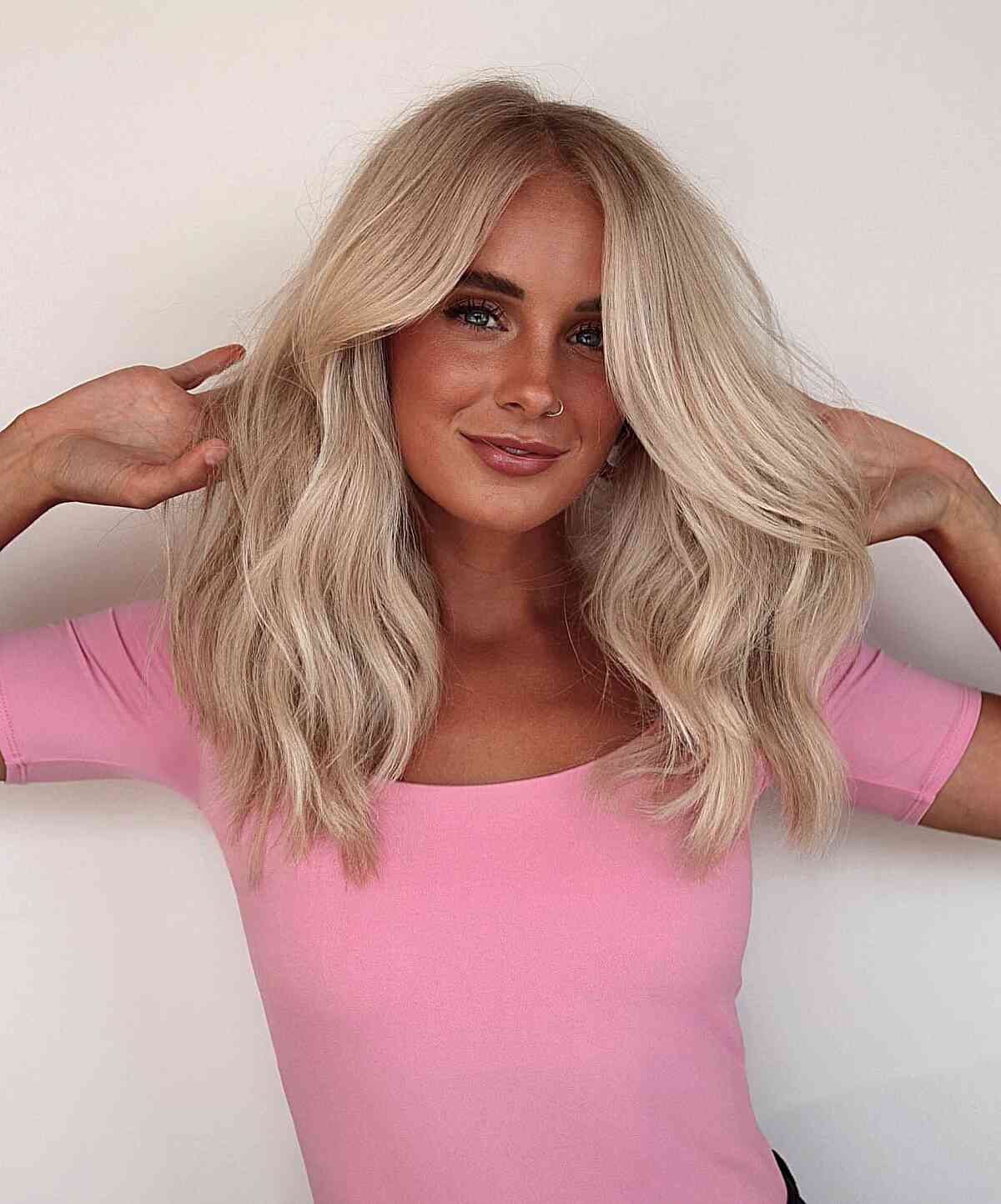 Medium-Length Barbie Blonde Hair with Root Smudge