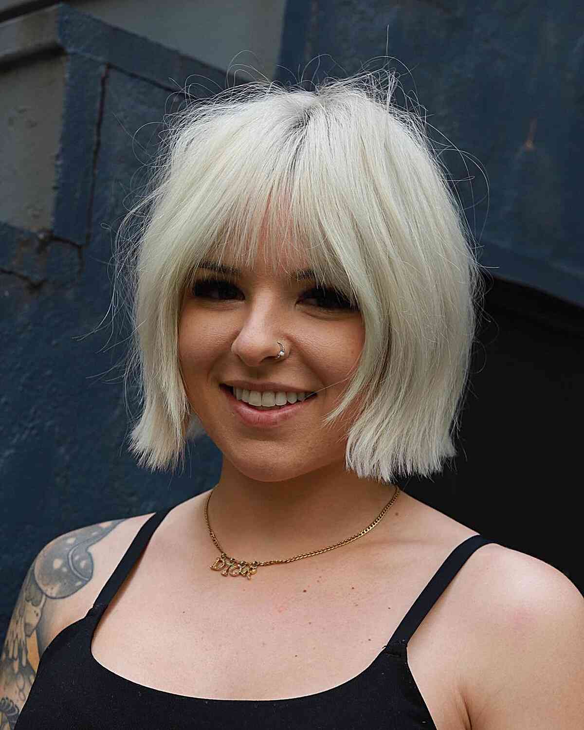 Beach Blonde Short Bob with Thin Bangs for chubby faces