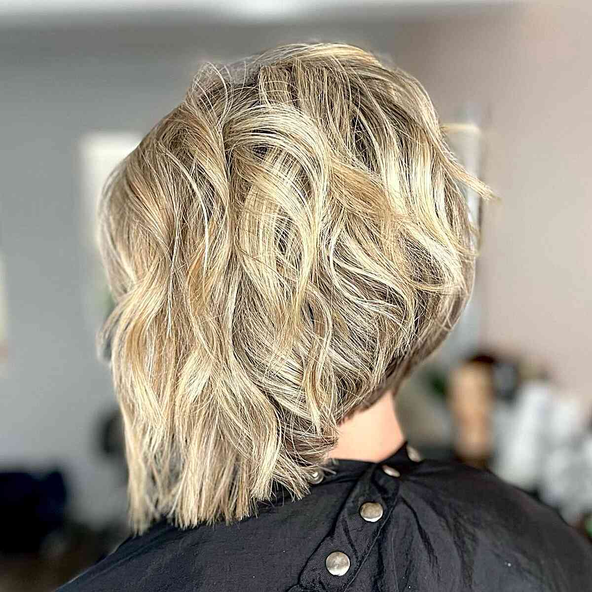 Beachy Champagne Blonde Wavy Bob with Shorter Layers