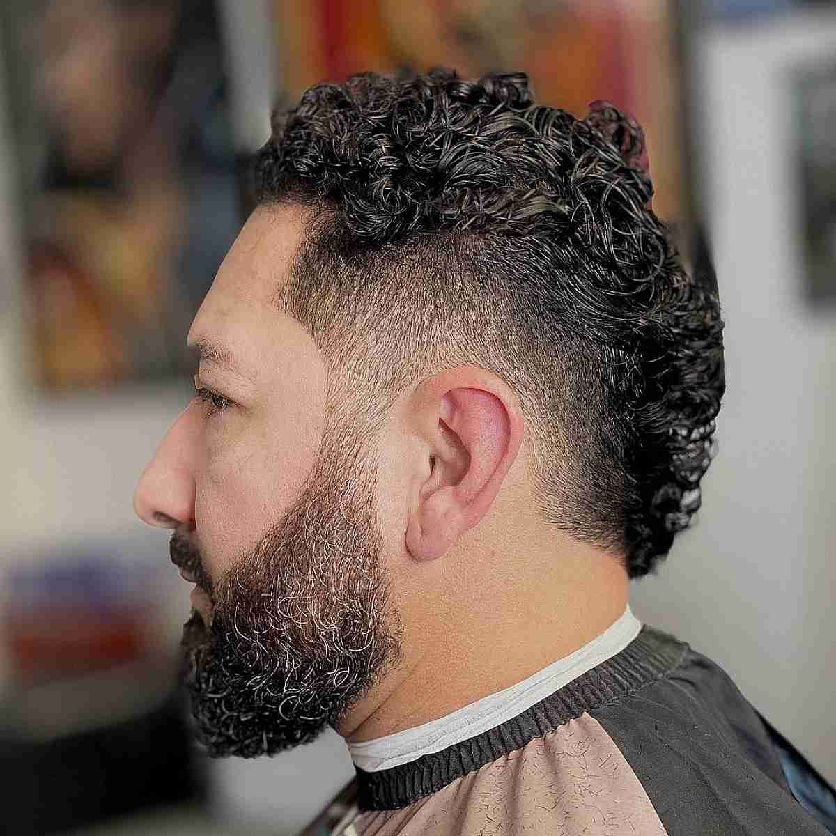 Bearded Fade on a Short Curly Mullet for Men