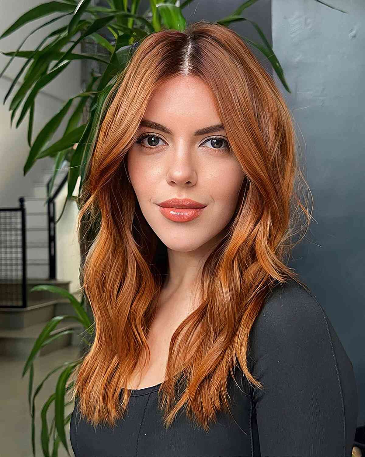 Beautiful Copperish Middle-Parted Waves on mid-length hair