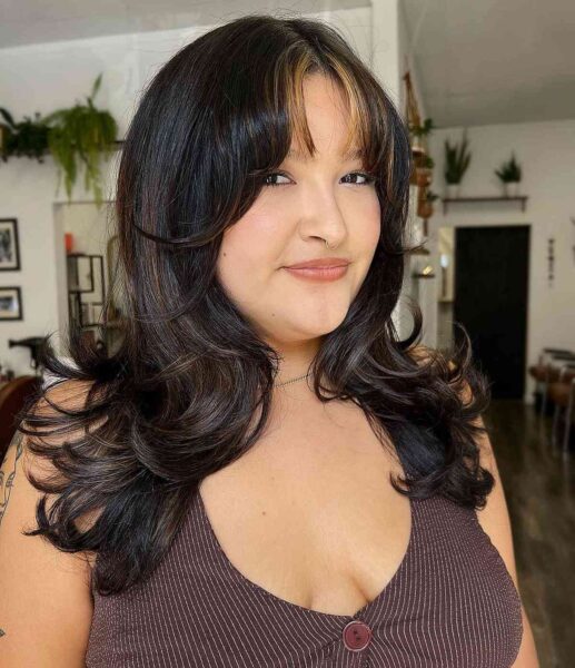 A Beautiful Dark Mid-Length Hair with Blonde Bangs for Round Faces